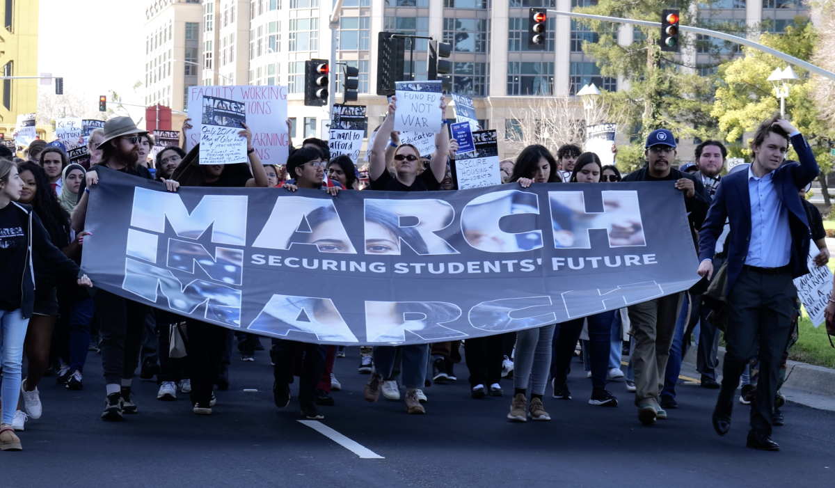 Hundreds+of+students+and+faculty+members+march+east+down+Capitol+Mall+Boulevard+in+Sacramento+toward+the+California+State+Capitol+on+March+7.+The+March+in+March+event+is+a+movement+calling+for+changes+in+higher+education+and+promoting+environmental+justice.